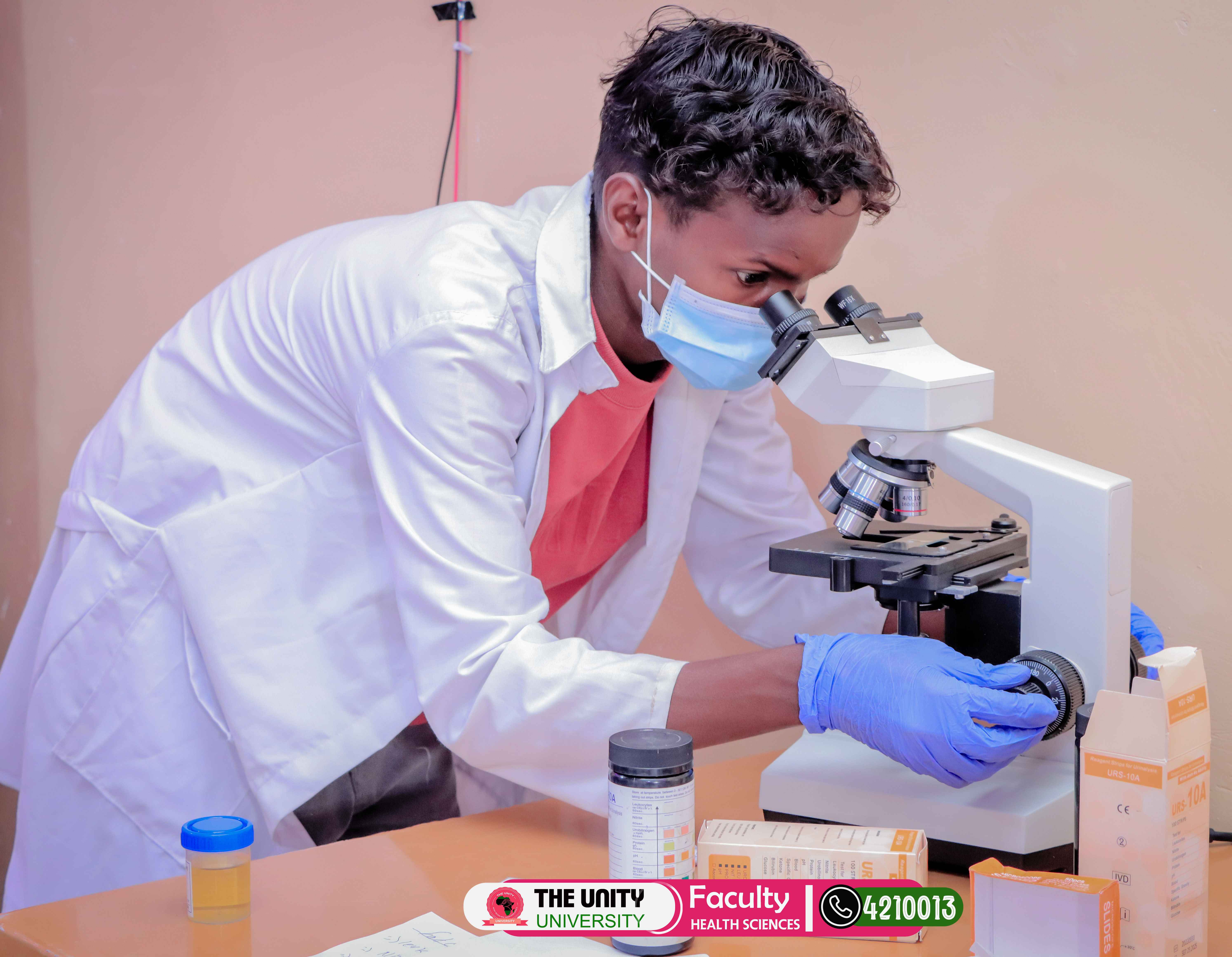 Students conducting experiments in Unity University science lab