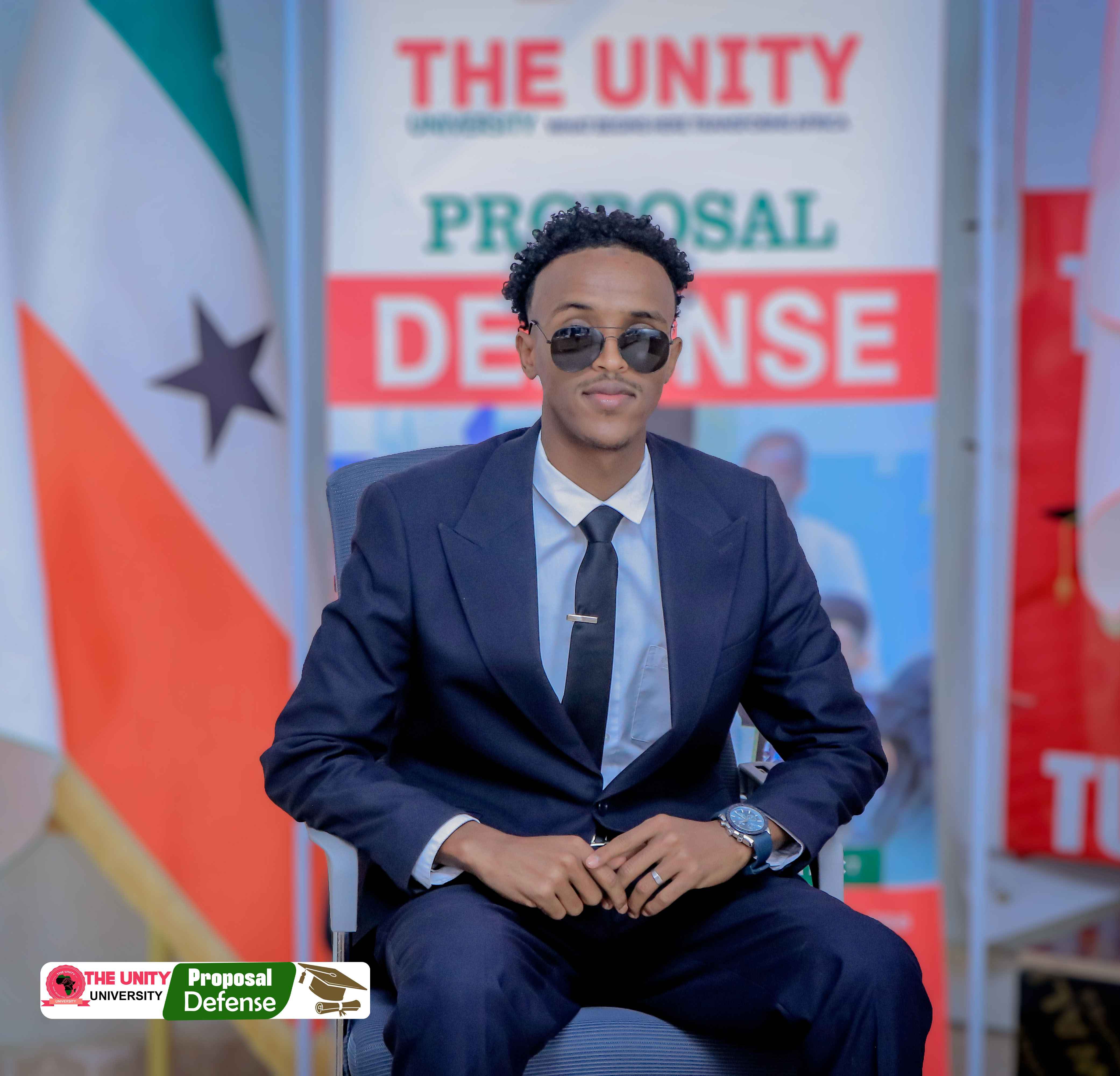 Unity University student presenting research on the podium